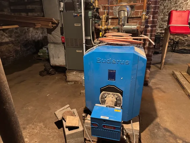 a view of a chairs and table in a patio