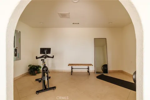 a view of an empty room with a closet