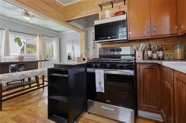 a view of a dining room with furniture window and outside view