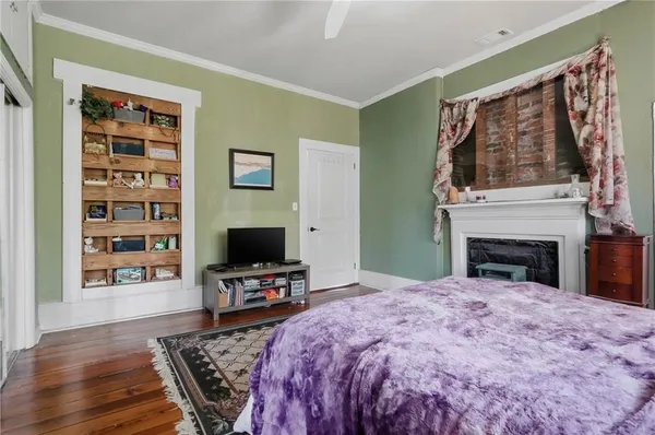 a view of a livingroom with furniture and a flat screen tv