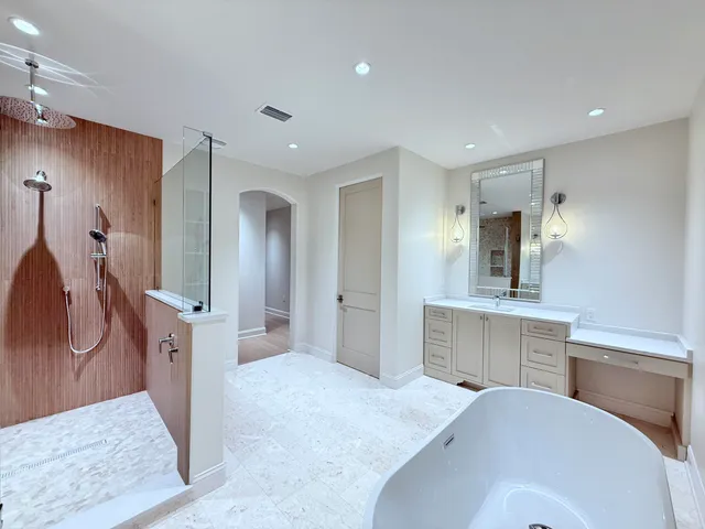 a view of a kitchen with cabinets