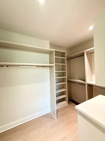 a view of a living room with clothes