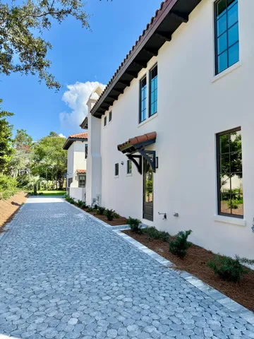 a stove top oven sitting inside of a kitchen