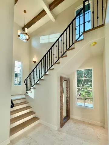 a bedroom with a bed and a cabinet