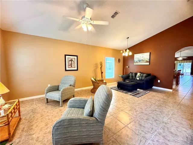 a kitchen with lots of counter top space and center island dining table