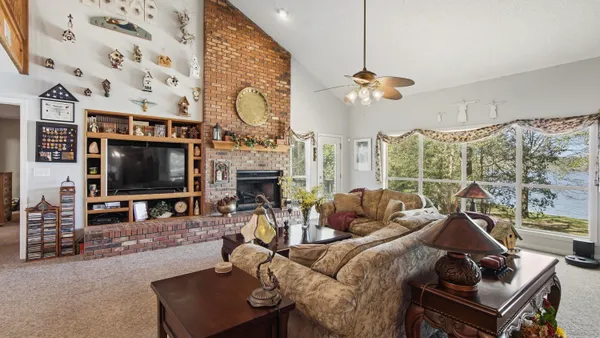 a kitchen with stainless steel appliances granite countertop a sink and cabinets
