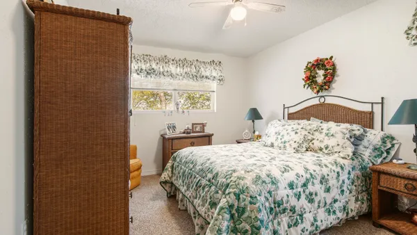 a bed room with a bed and a couch