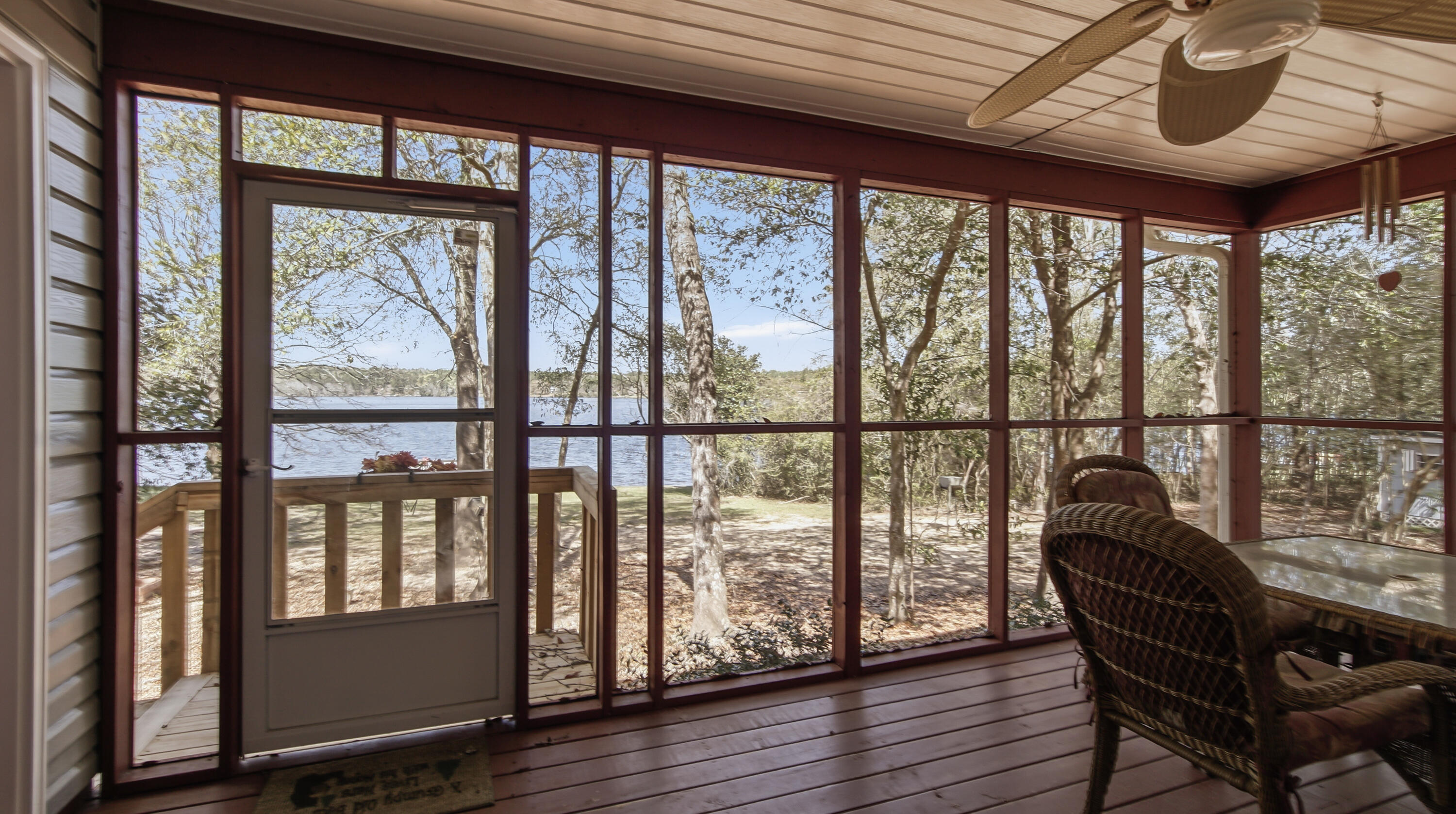 2272 Spring Lake Road DeFuniak Springs, FL 32433 - Photo 45 of 48 a view of a balcony with wooden floor