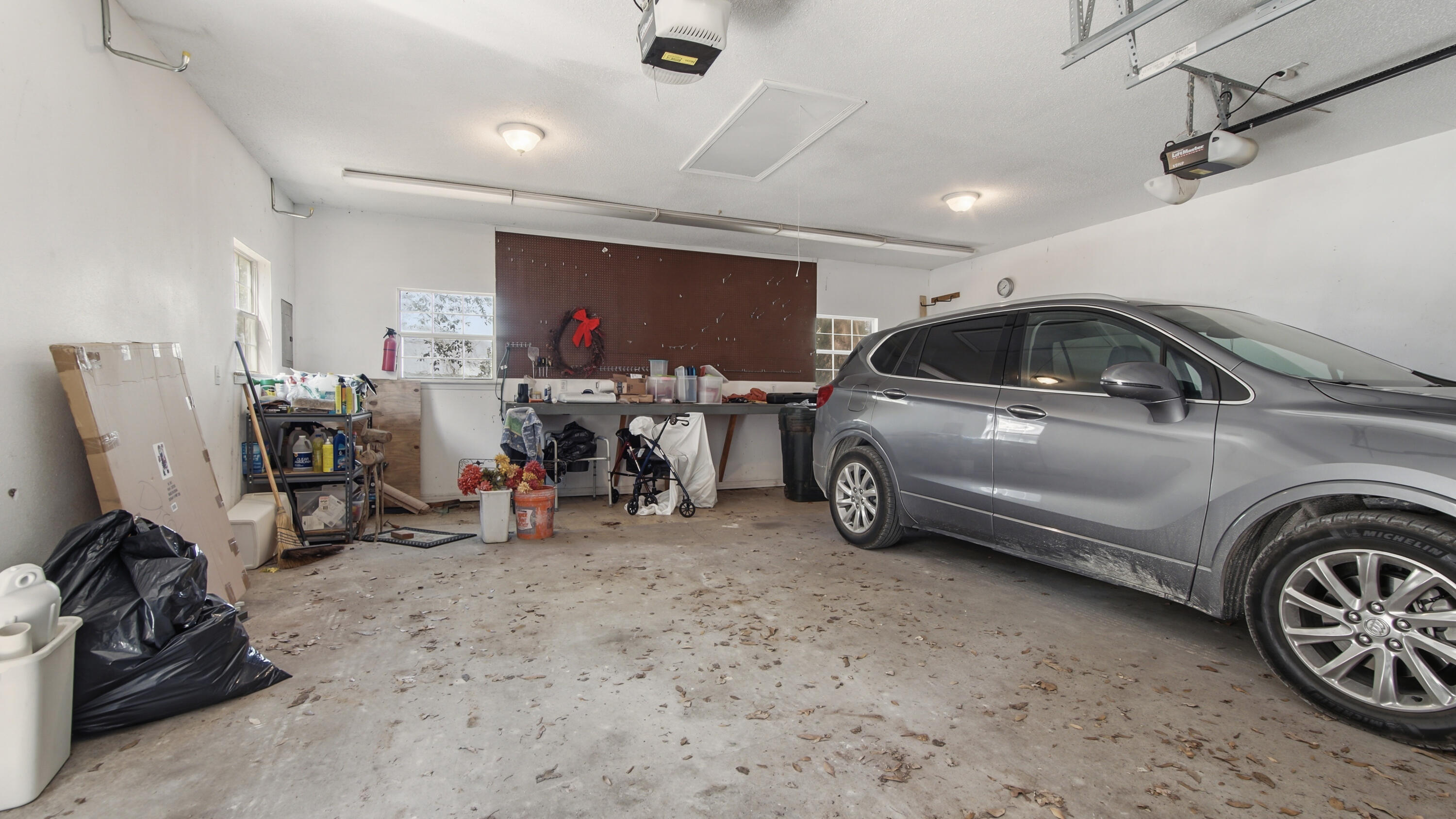 2272 Spring Lake Road DeFuniak Springs, FL 32433 - Photo 48 of 48 a view of a garage with parked cars