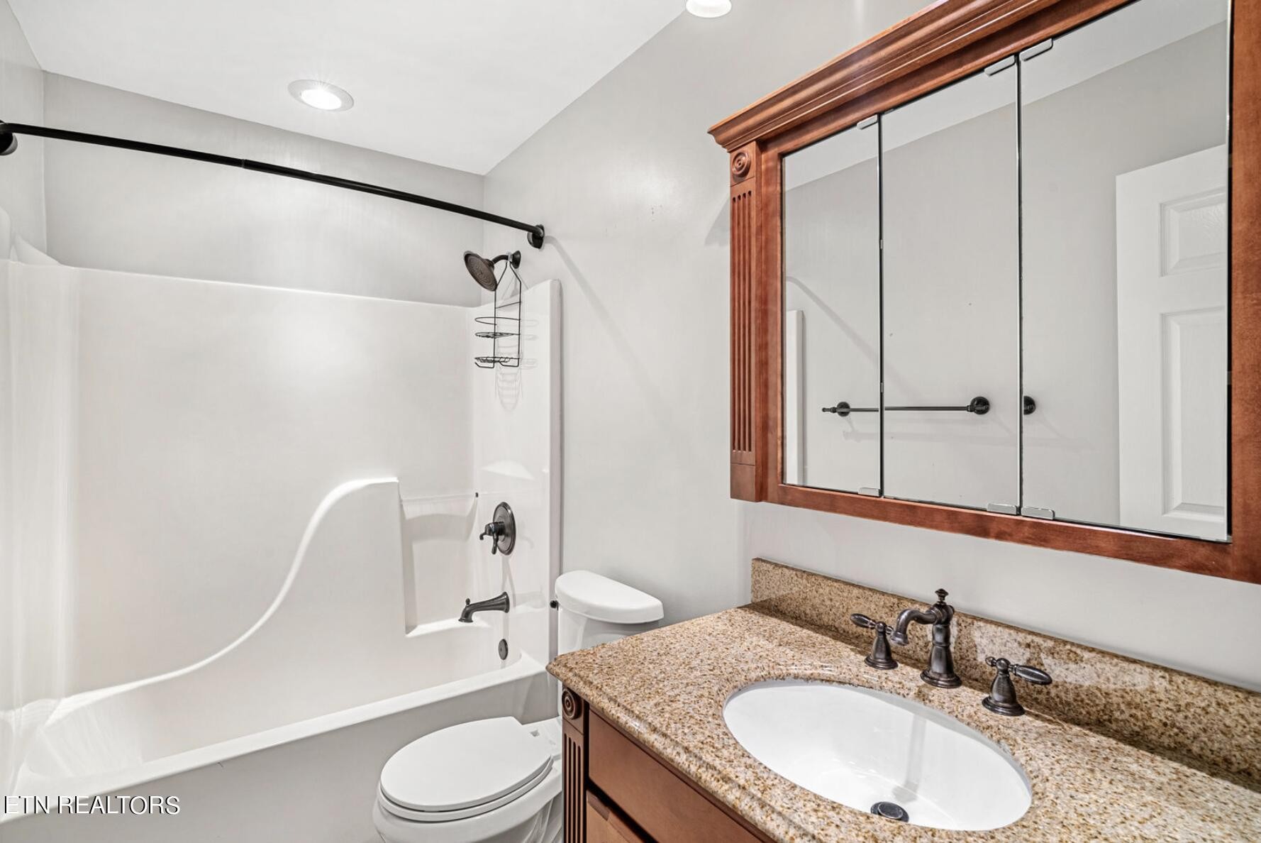 4348 Walnut Ridge Lane Knoxville, TN 37921 - Photo 17 of 31 a bathroom with a sink toilet and shower