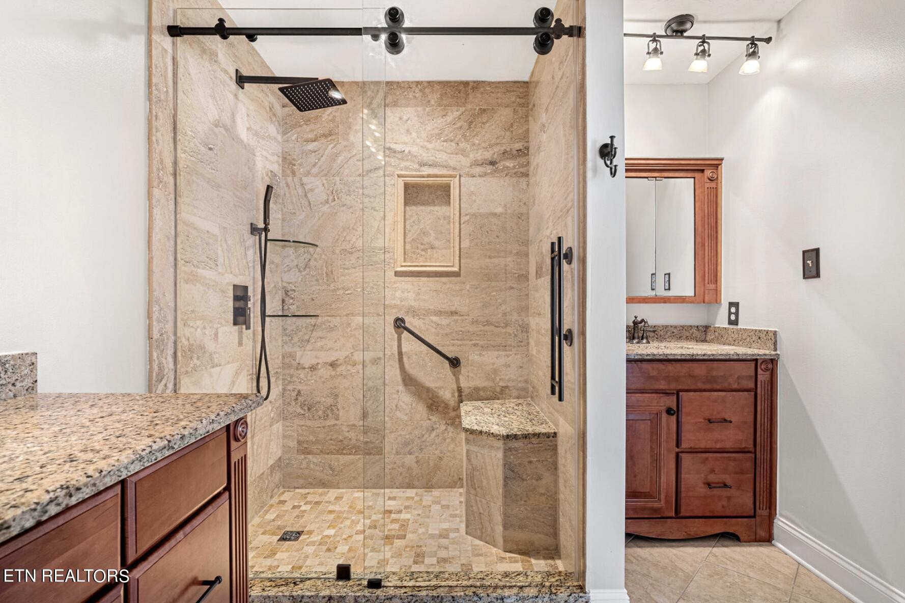4348 Walnut Ridge Lane Knoxville, TN 37921 - Photo 22 of 31 a bathroom with a granite countertop shower sink and mirror