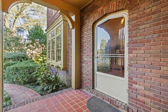 a view of a door and chair