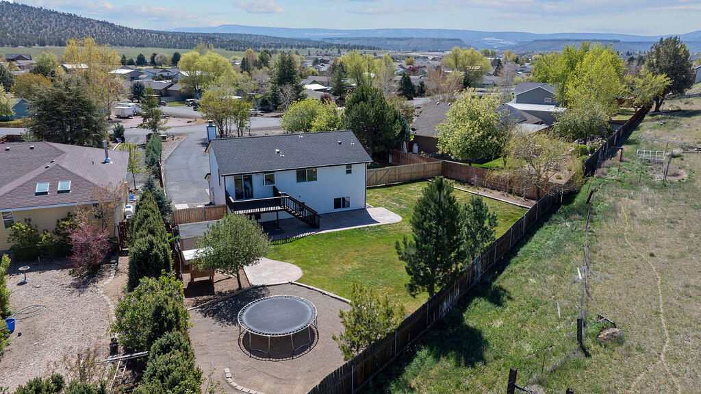 2979 Northeast Sugar Pine Road Prineville, OR 97754 - Photo 31 of 31 an aerial view of a house with garden space and a patio