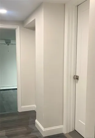 a view of small space with wooden floor