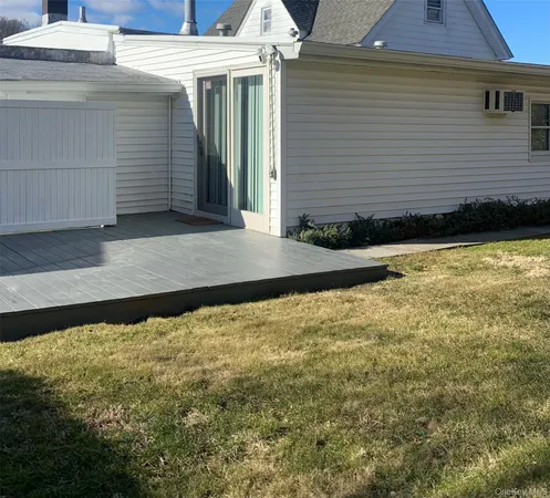a view of a backyard of the house