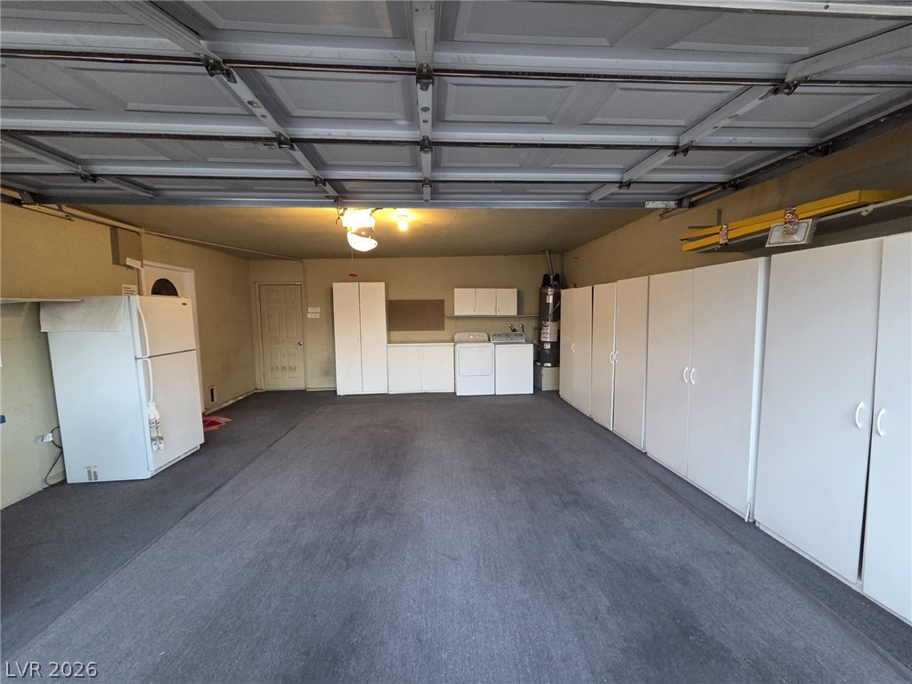 3317 Racquet Street Las Vegas, NV 89121 - Photo 23 of 23 This spacious garage offers abundant storage solutions and practical utility space.