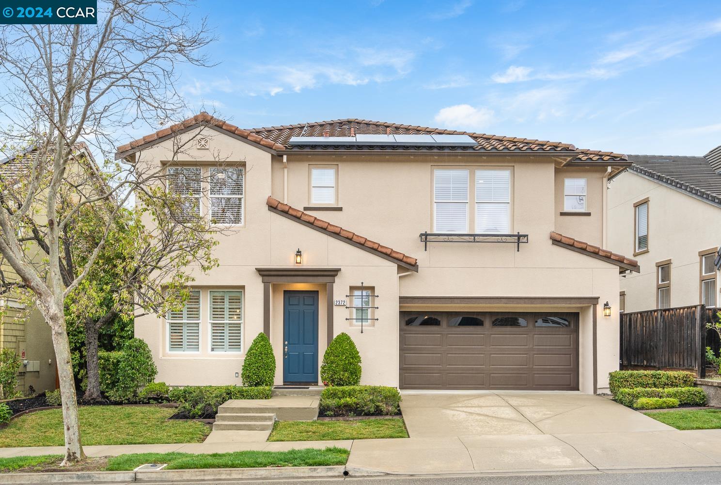 2372 Baker Way San Ramon, CA 94582 - Photo 1 of 1 a front view of a house with a yard and garage