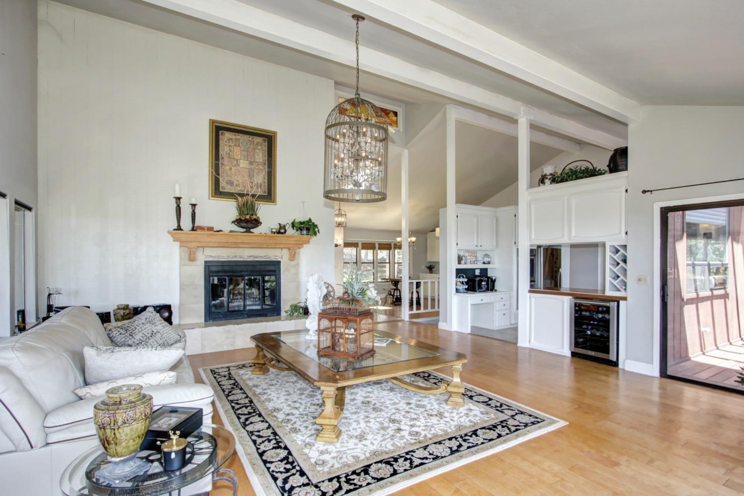 18119 Norlene Way Grass Valley, CA 95949 - Photo 14 of 93 a living room with furniture and a fireplace