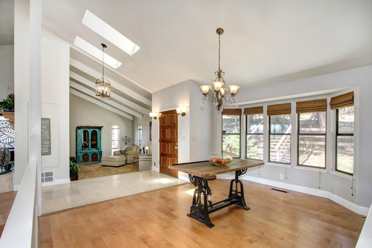 18119 Norlene Way Grass Valley, CA 95949 - Photo 31 of 93 a living room with furniture and a chandelier