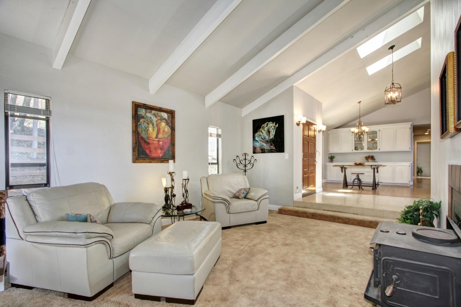 18119 Norlene Way Grass Valley, CA 95949 - Photo 38 of 93 a living room with furniture and a flat screen tv