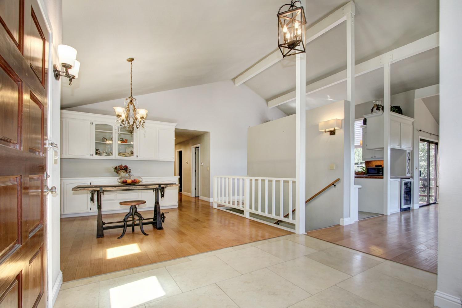 18119 Norlene Way Grass Valley, CA 95949 - Photo 39 of 93 a view of a livingroom with furniture wooden floor and a chandelier