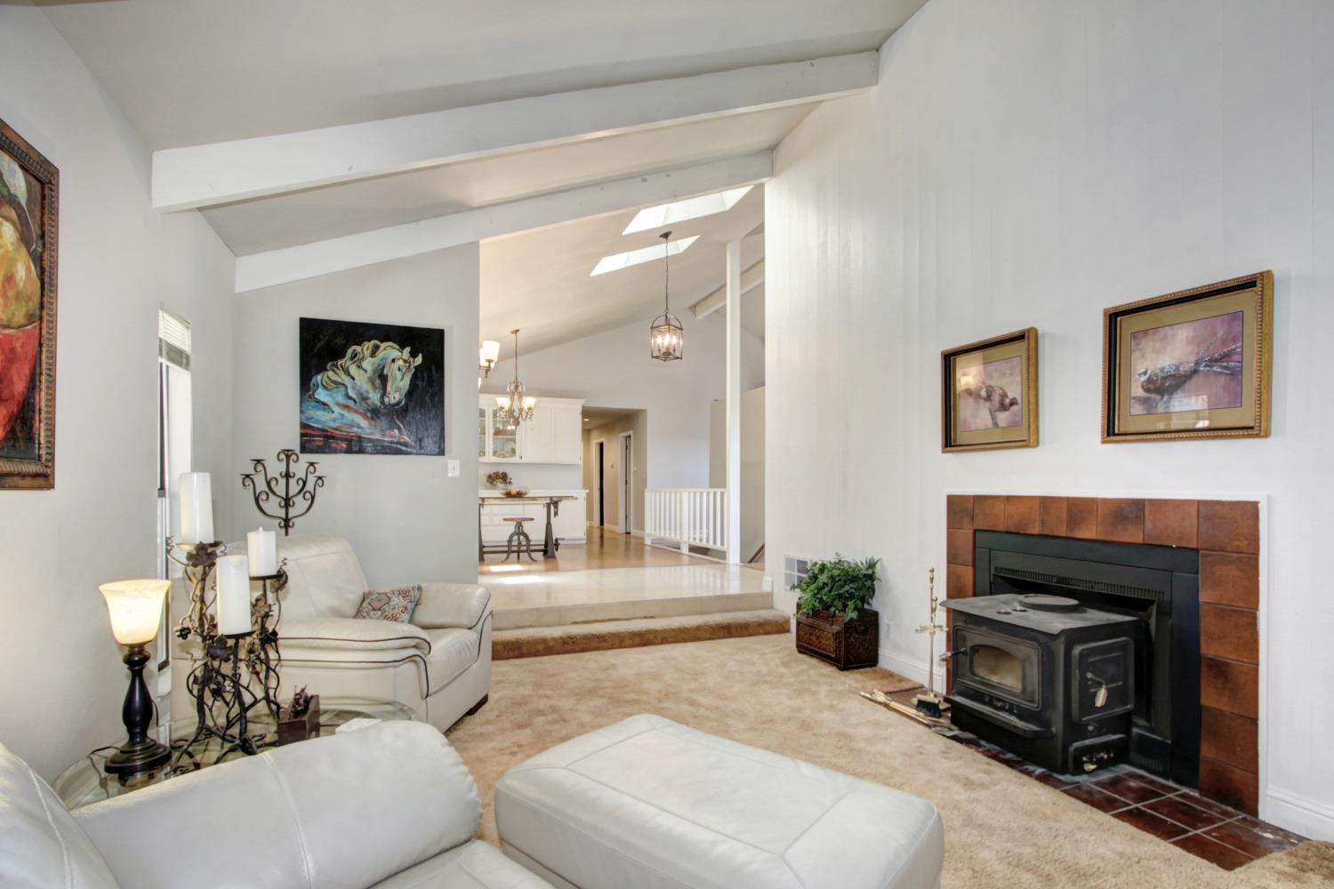 18119 Norlene Way Grass Valley, CA 95949 - Photo 40 of 93 a living room with furniture and a fireplace