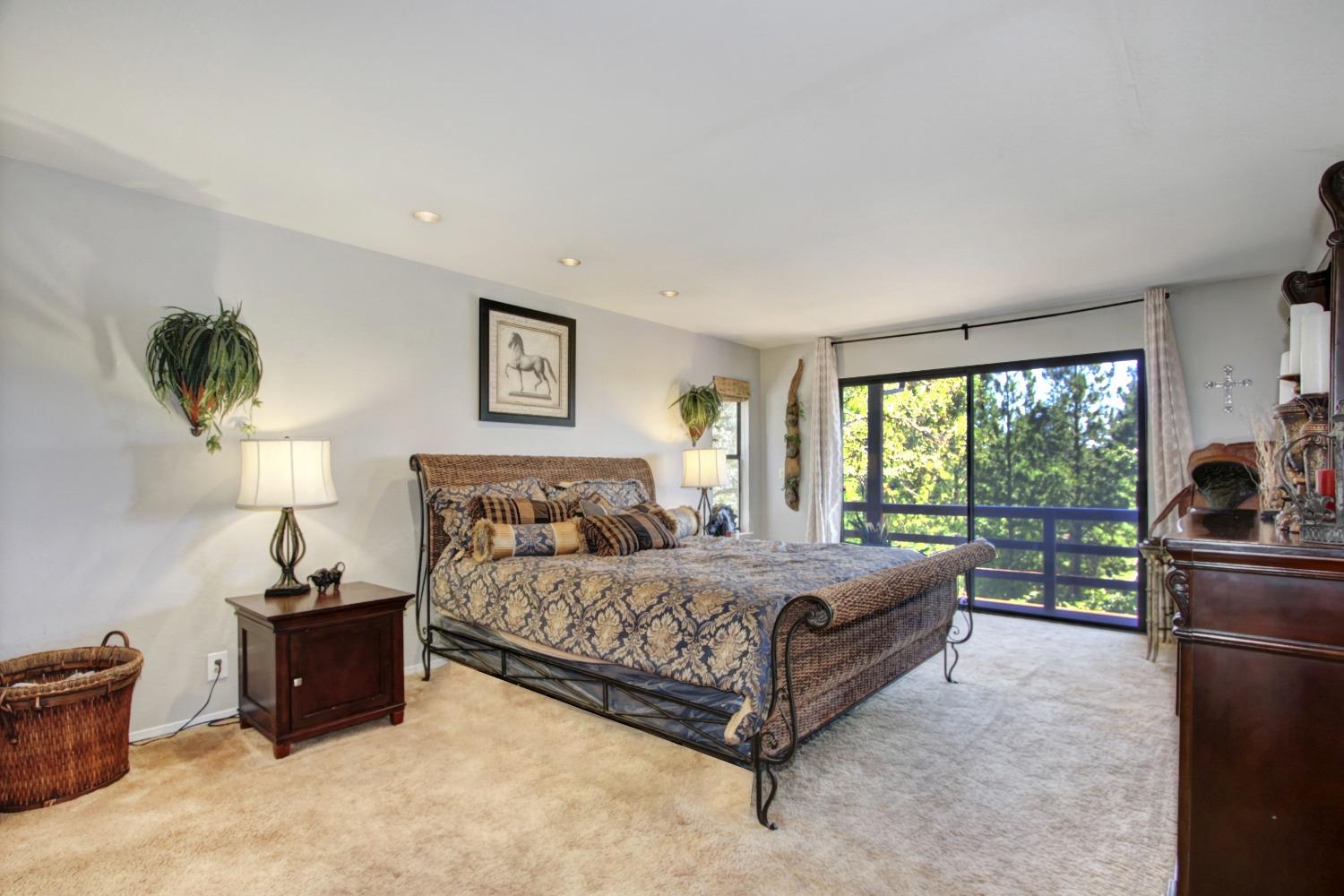 18119 Norlene Way Grass Valley, CA 95949 - Photo 44 of 93 a bedroom with a bed and a window
