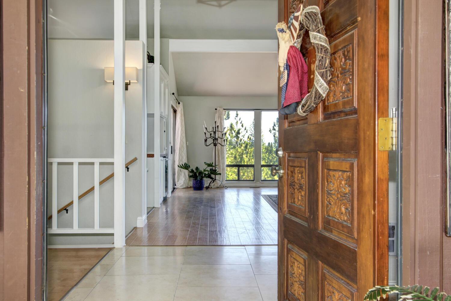 18119 Norlene Way Grass Valley, CA 95949 - Photo 6 of 93 a view of entryway and hall with wooden floor