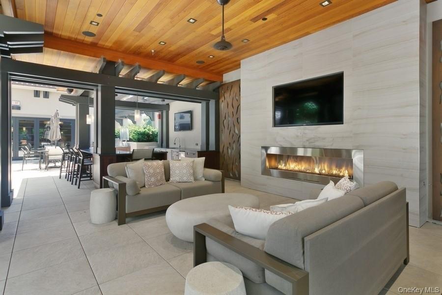 15 Kensington Road, Unit 303 Bronxville, NY 10708 - Photo 20 of 24 Covered outdoor Club area