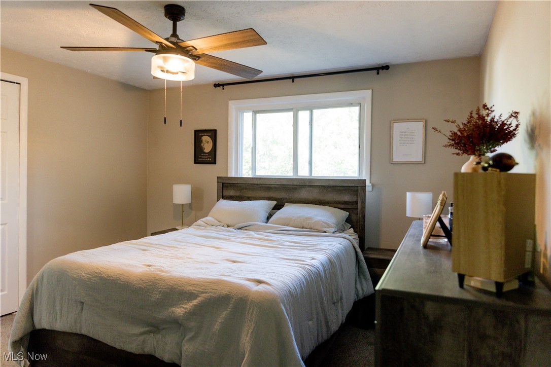 5861 Lee Avenue North Ridgeville, OH 44039 - Photo 11 of 20 Bedroom featuring a ceiling fan