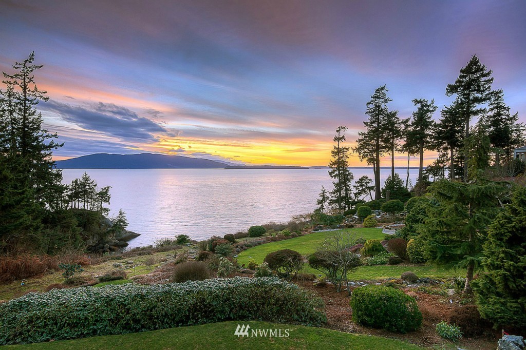 804 Fieldston Road Bellingham, WA 98225 - Photo 2 of 25 a view of a lake and a yard