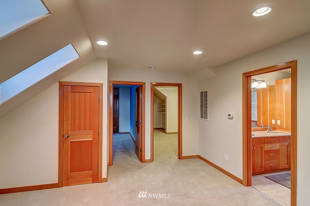 804 Fieldston Road Bellingham, WA 98225 - Photo 18 of 25 an empty room with closet and wooden door