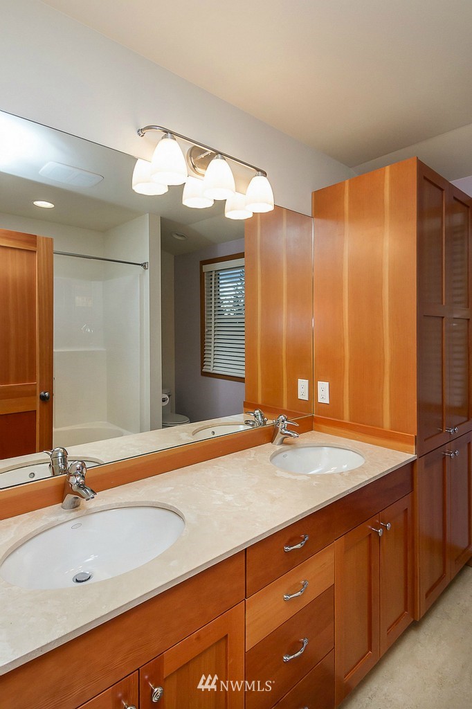 804 Fieldston Road Bellingham, WA 98225 - Photo 19 of 25 a bathroom with a sink and a mirror