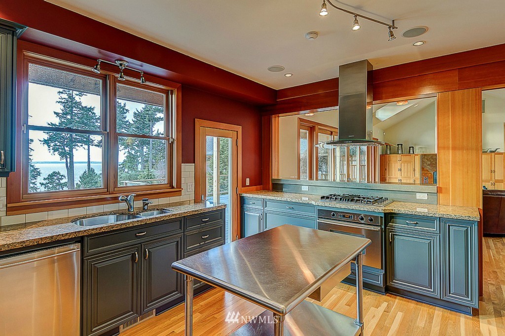 804 Fieldston Road Bellingham, WA 98225 - Photo 8 of 25 a kitchen with stainless steel appliances granite countertop a sink and a stove