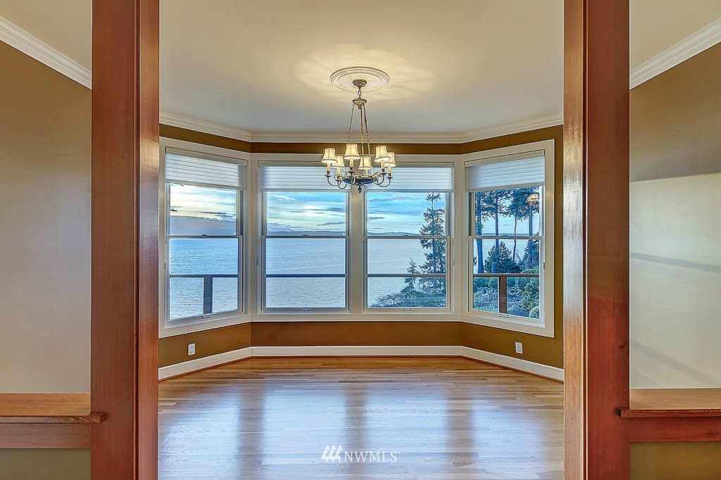 804 Fieldston Road Bellingham, WA 98225 - Photo 10 of 25 a view of empty room with wooden floor and fan
