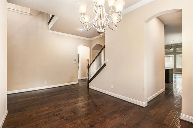 a view of a hallway with staircase