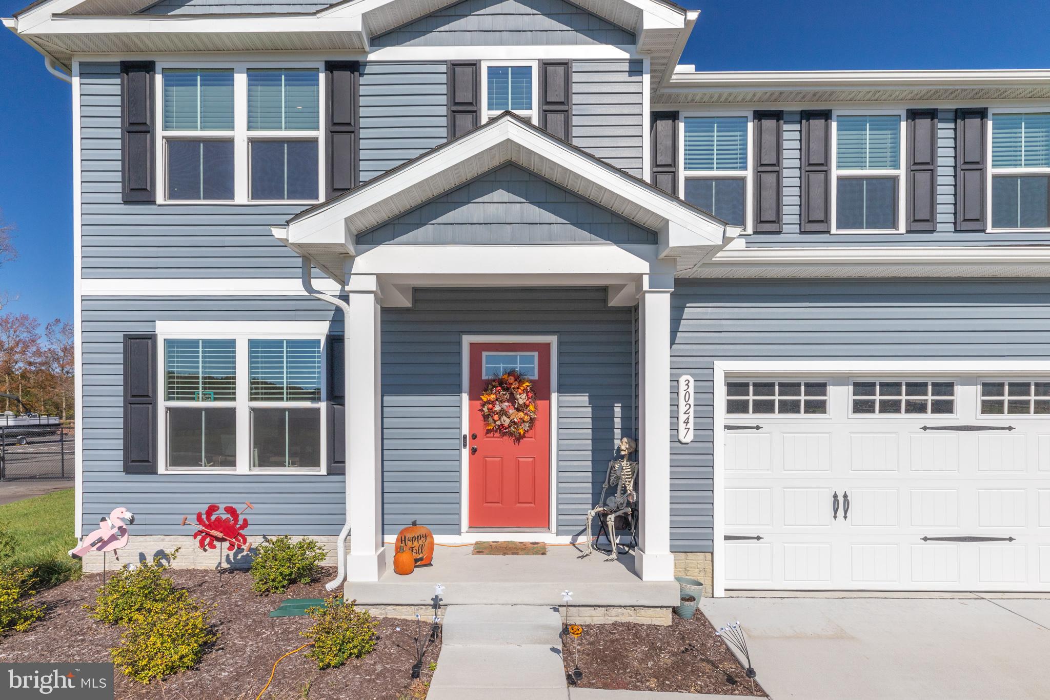 a front view of a house with an outdoor space