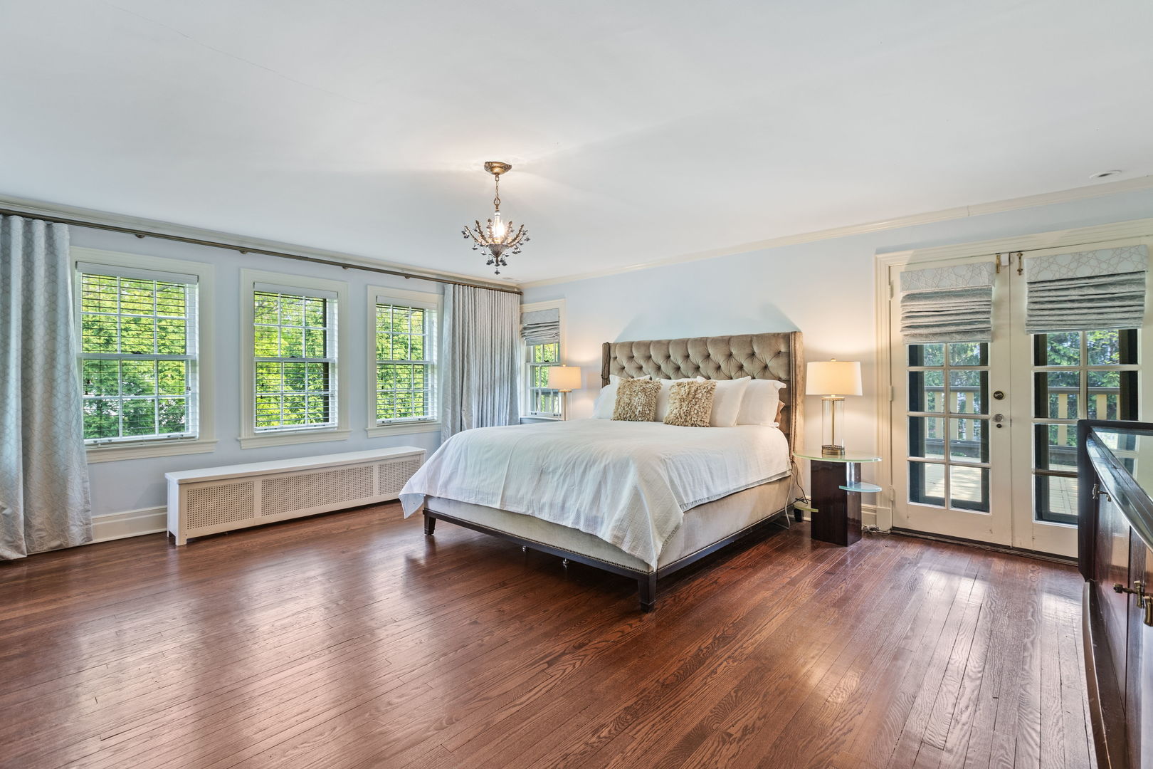 600 Ash Street Winnetka, IL 60093 - Photo 13 of 30 a bedroom with a large bed and a large window