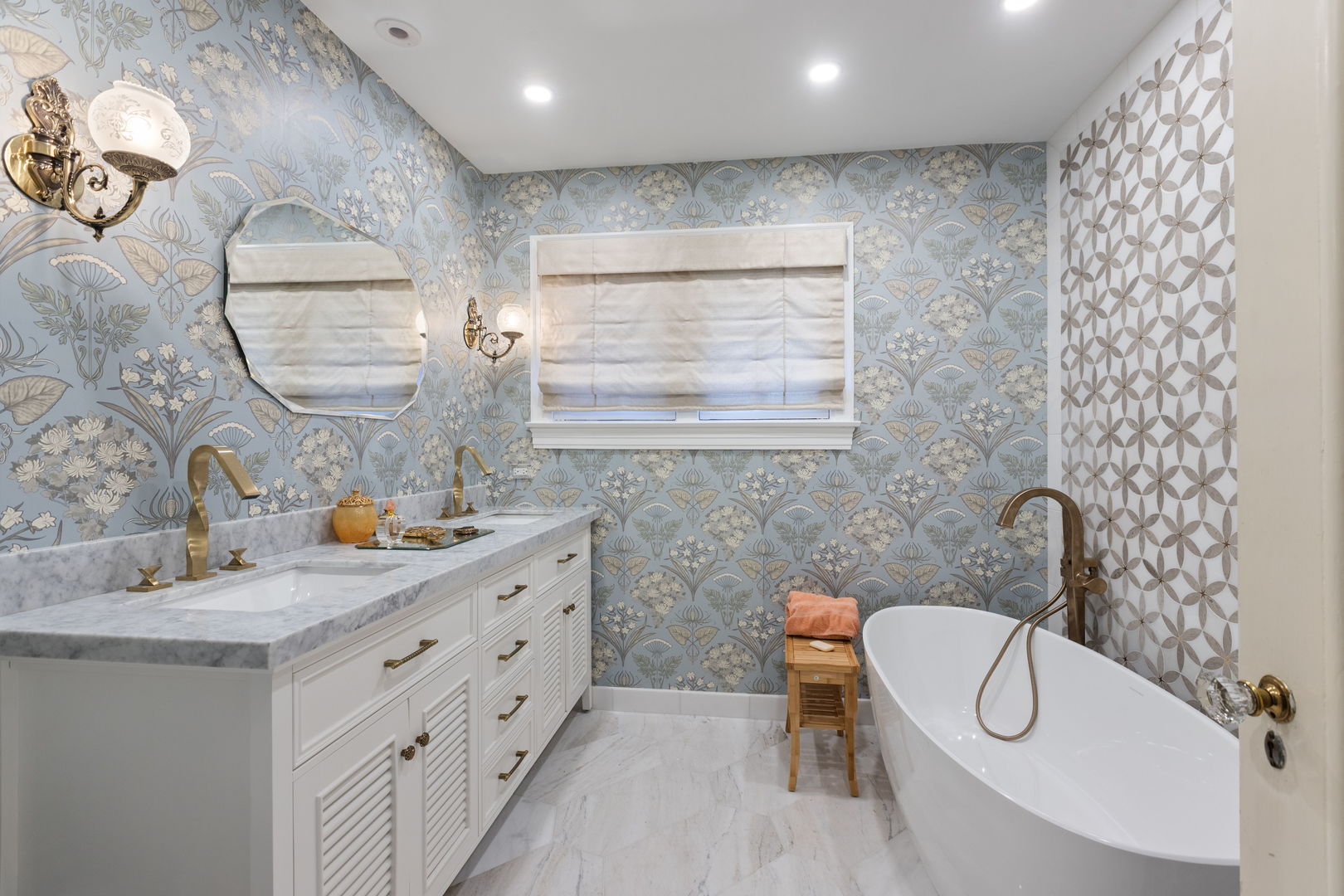 600 Ash Street Winnetka, IL 60093 - Photo 19 of 30 a bathroom with a granite countertop sink a toilet and a mirror