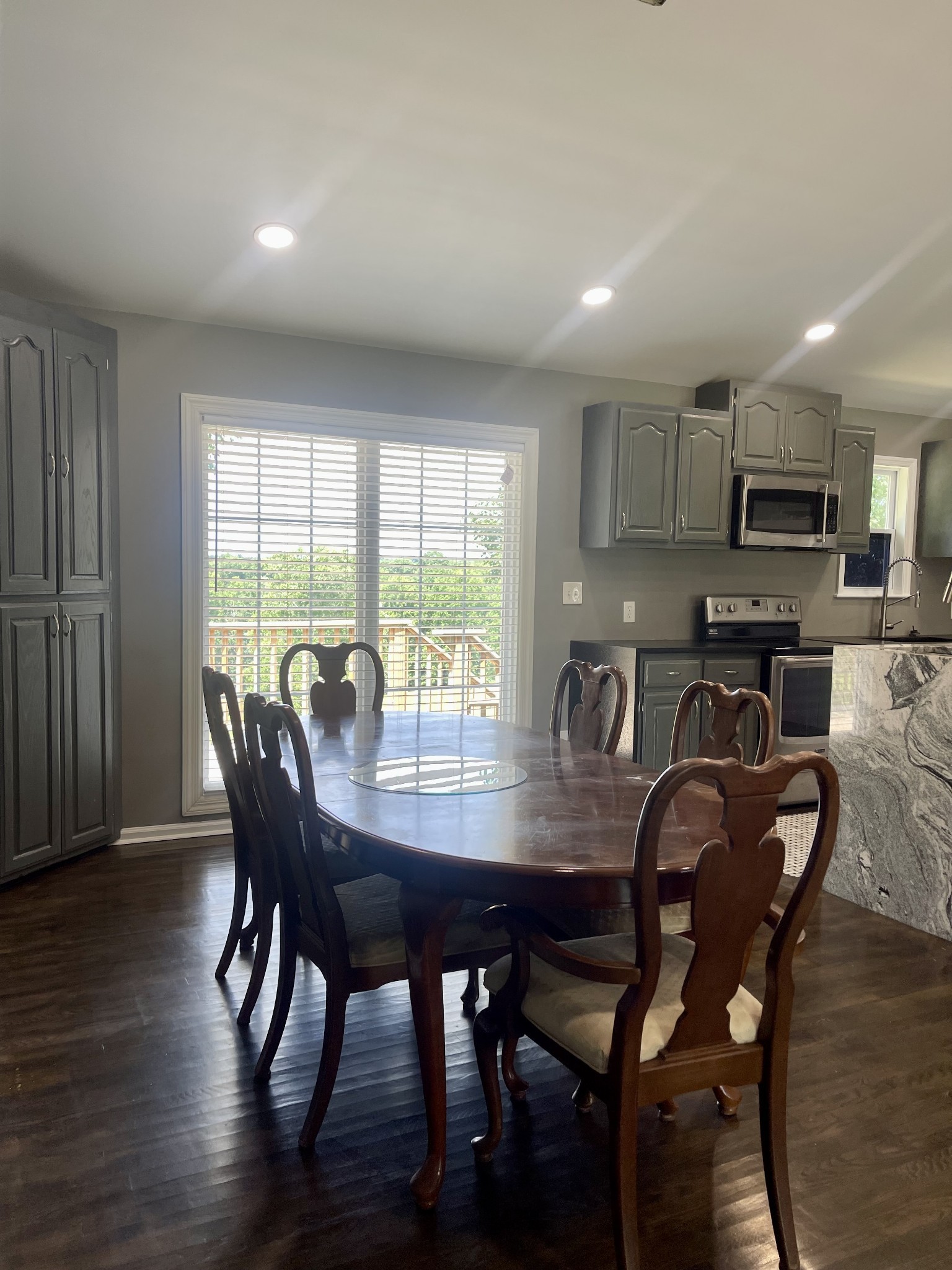 1213 West Point Road Lawrenceburg, TN 38464 - Photo 15 of 37 a view of a dining room with furniture window and wooden floor