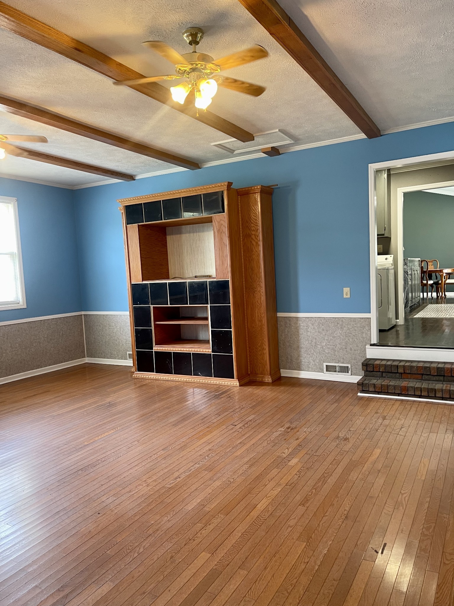 1213 West Point Road Lawrenceburg, TN 38464 - Photo 19 of 37 a view of empty room with wooden floor and fan