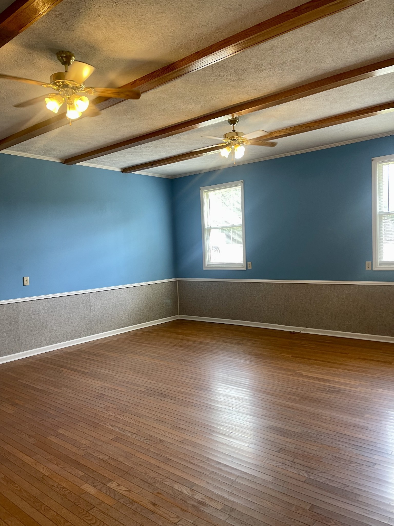 1213 West Point Road Lawrenceburg, TN 38464 - Photo 20 of 37 a view of an empty room with wooden floor and a window