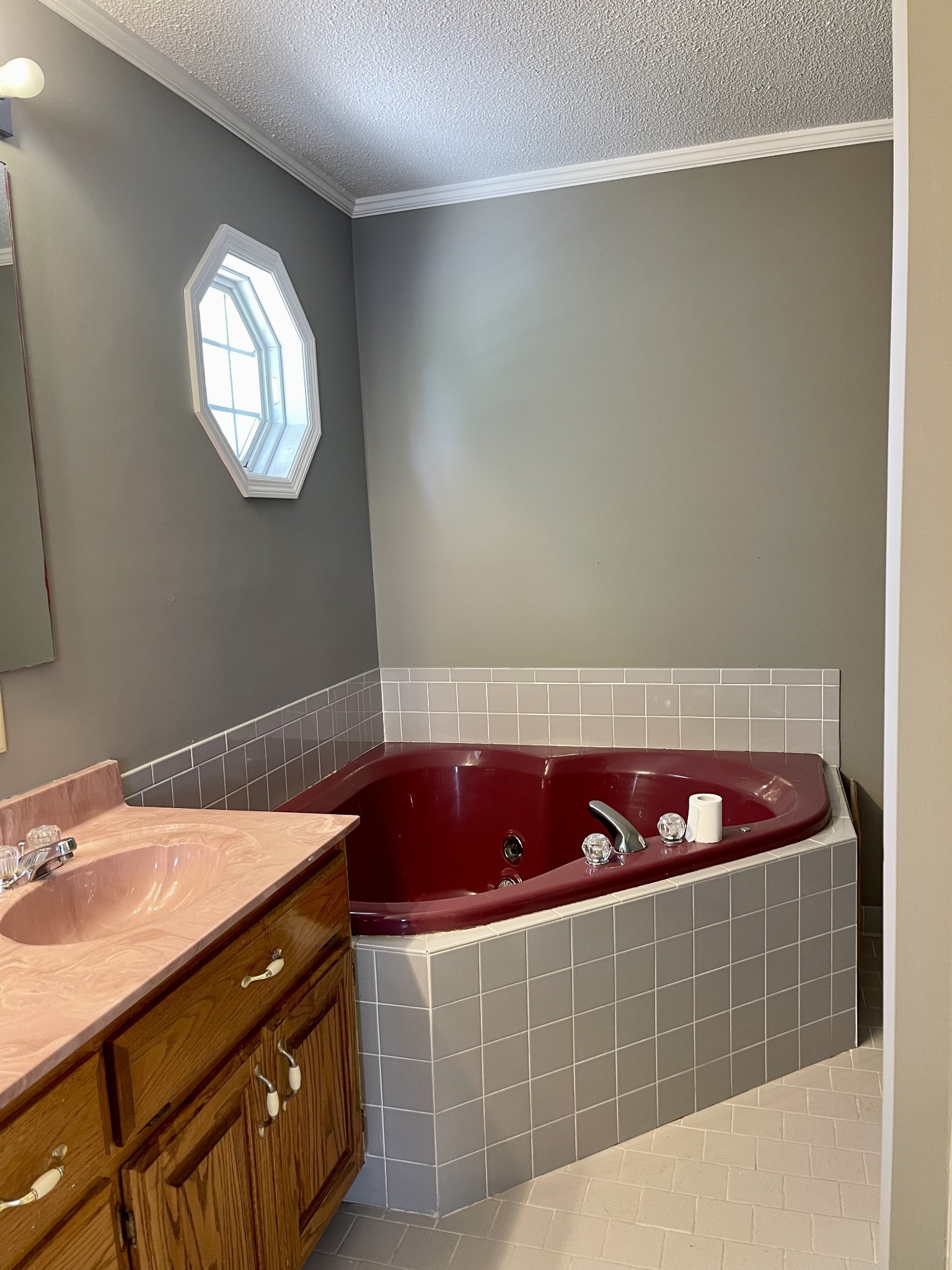 1213 West Point Road Lawrenceburg, TN 38464 - Photo 28 of 37 a bathroom with a sink and a mirror
