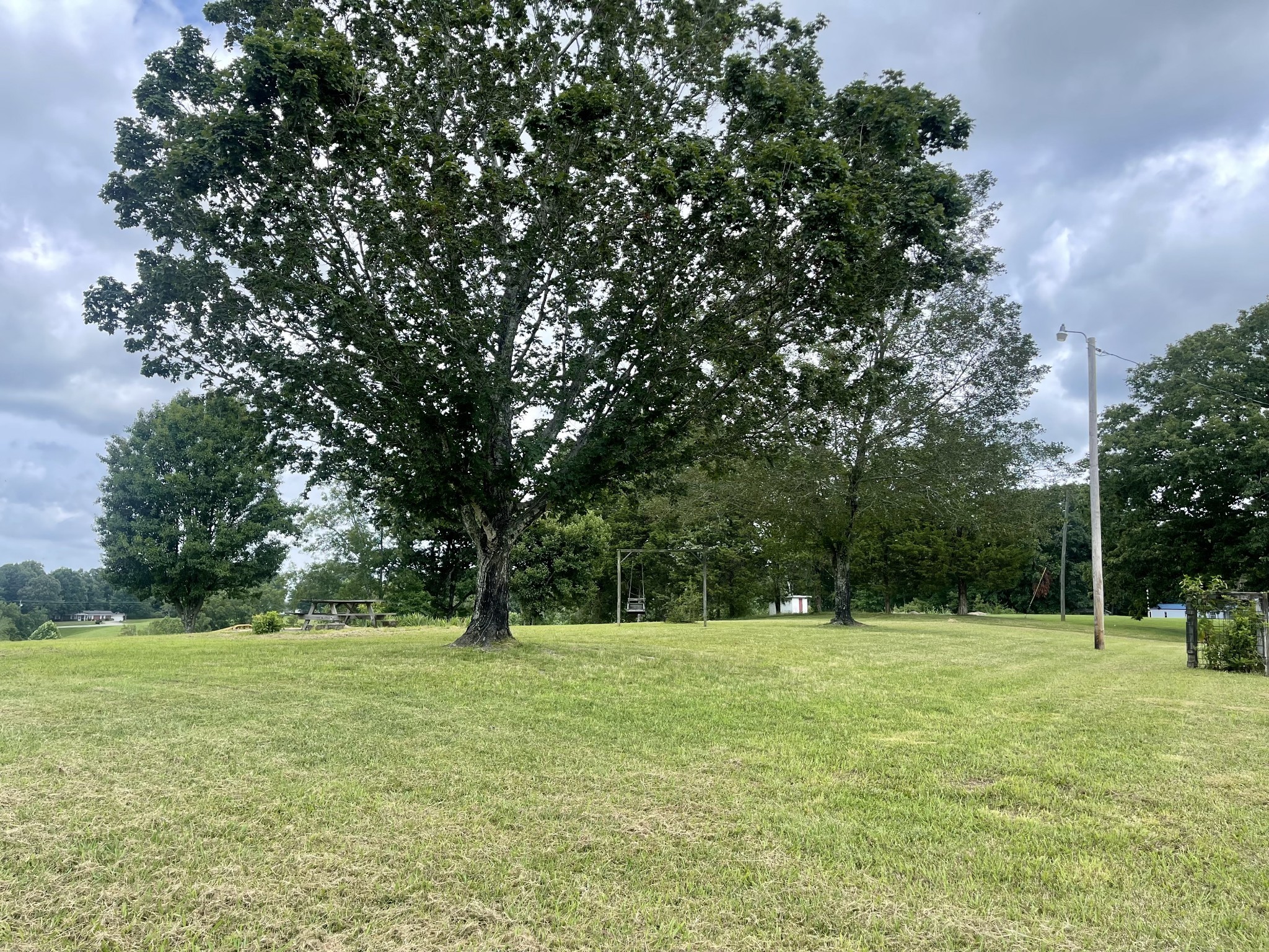 1213 West Point Road Lawrenceburg, TN 38464 - Photo 35 of 37 a view of green field with trees