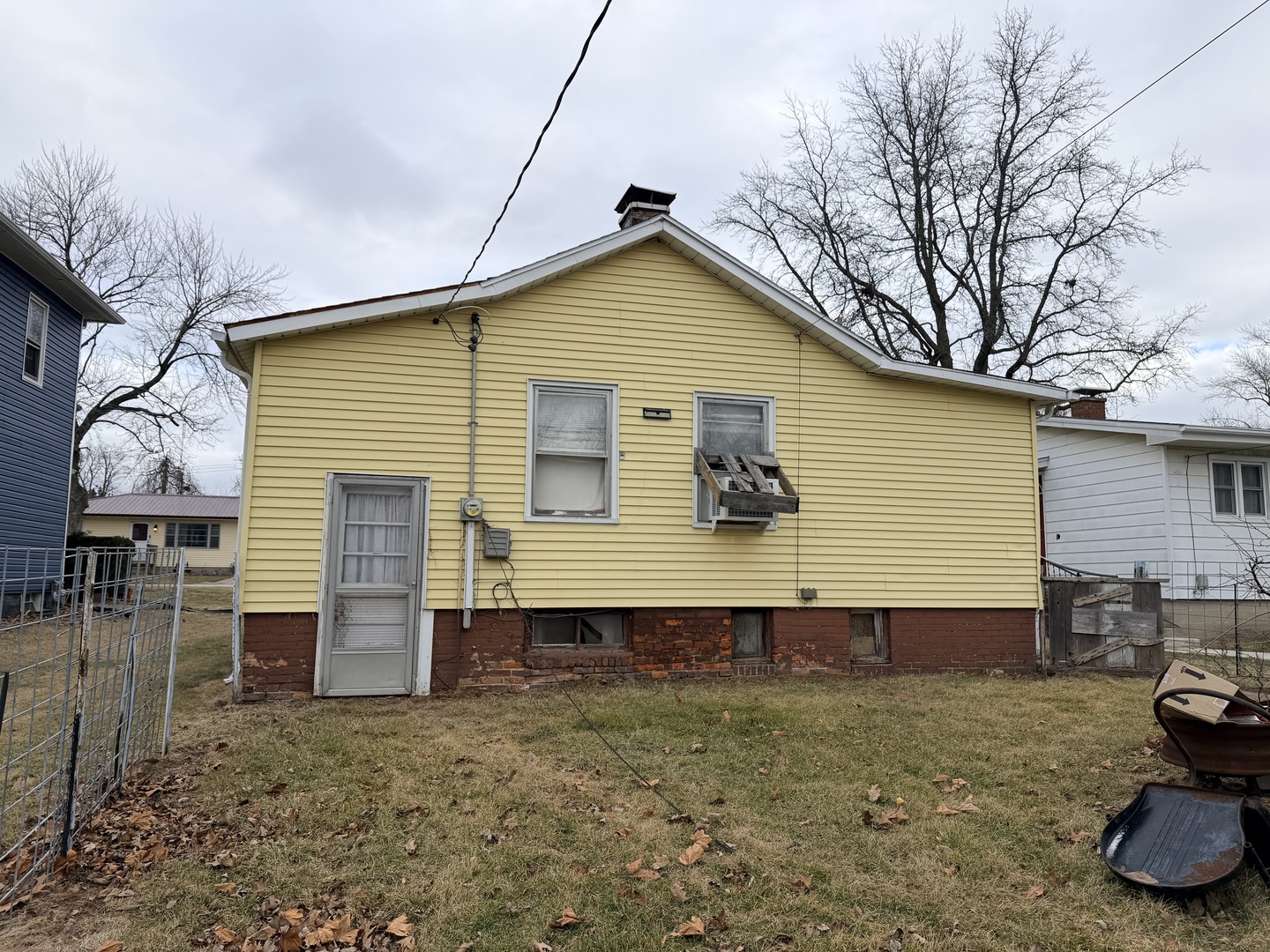 315 North Walnut Street Clinton, IL 61727 - Photo 2 of 3 a view of backyard of house