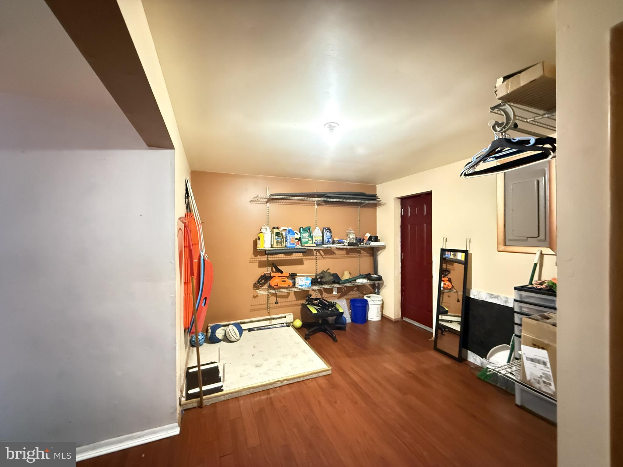 6271 Decker Road Bushkill, PA 18324 - Photo 23 of 49 Spacious utility room with organized shelves.