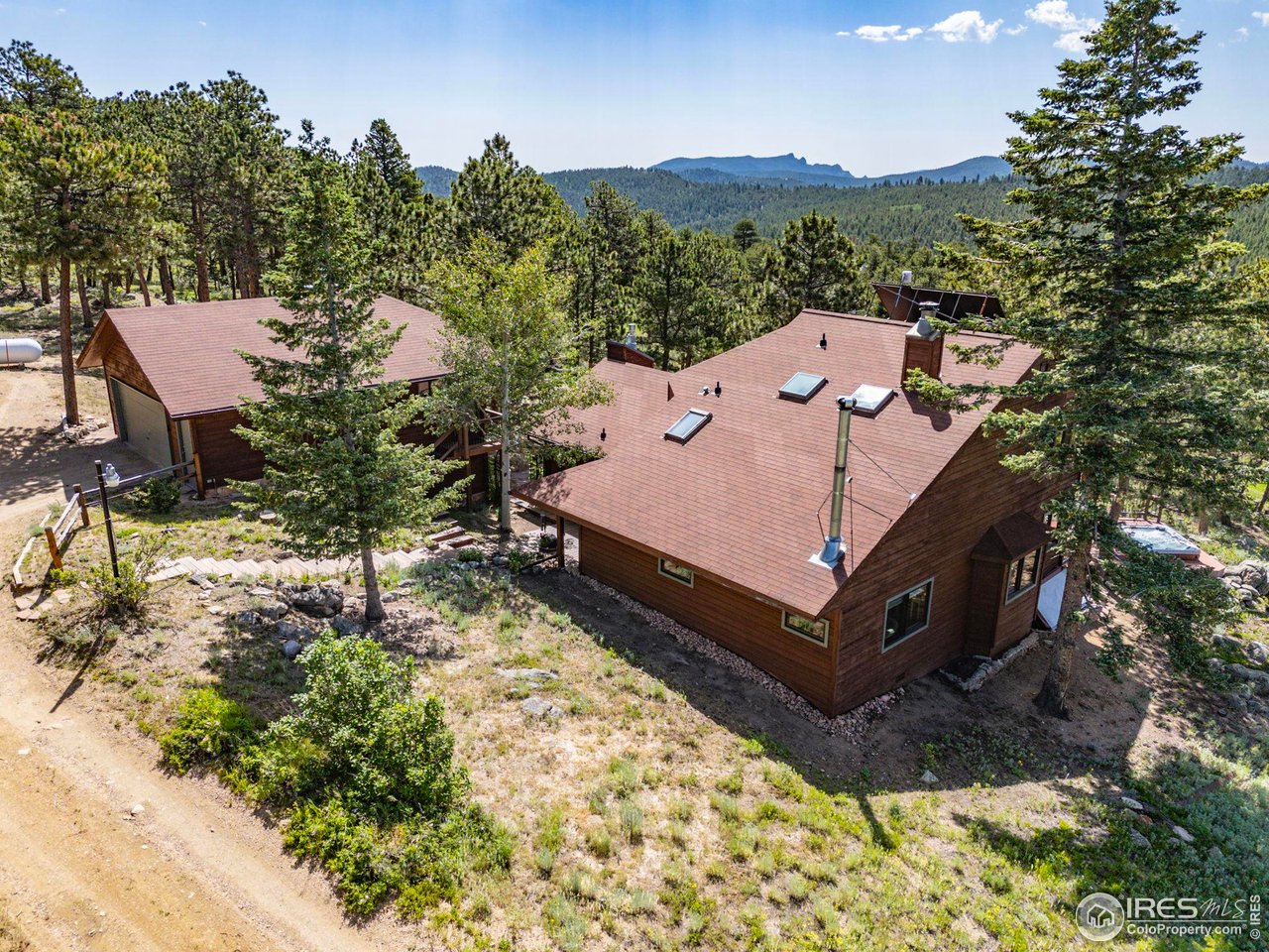 208 Coughlin Meadows Road Boulder, CO 80302 - Photo 10 of 50 Skylights bring in additional natural light to this bright and sun-filled design