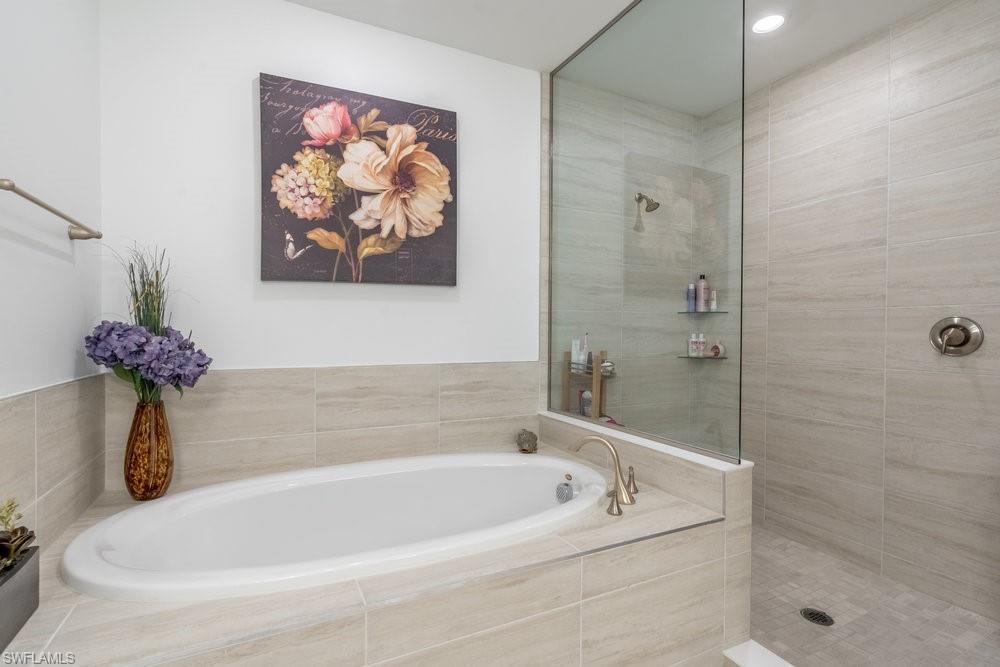 16347 Viansa Way, Unit 102 Naples, FL 34110 - Photo 14 of 40 Primary separate tub and shower
