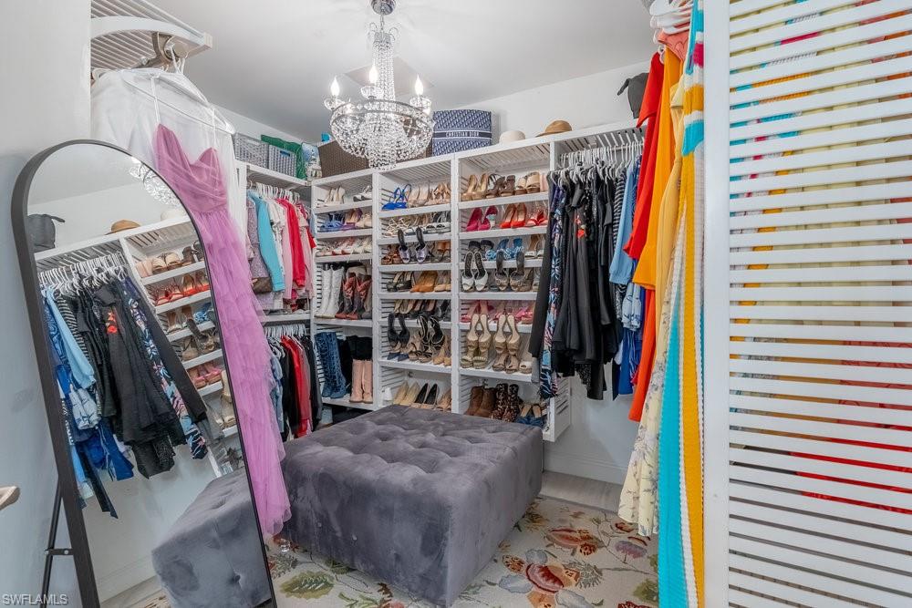 16347 Viansa Way, Unit 102 Naples, FL 34110 - Photo 15 of 40 Primary Closet with build out