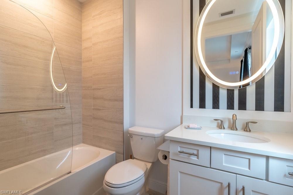 16347 Viansa Way, Unit 102 Naples, FL 34110 - Photo 18 of 40 2nd Bedroom full ensuite Bathroom with combo tub and shower